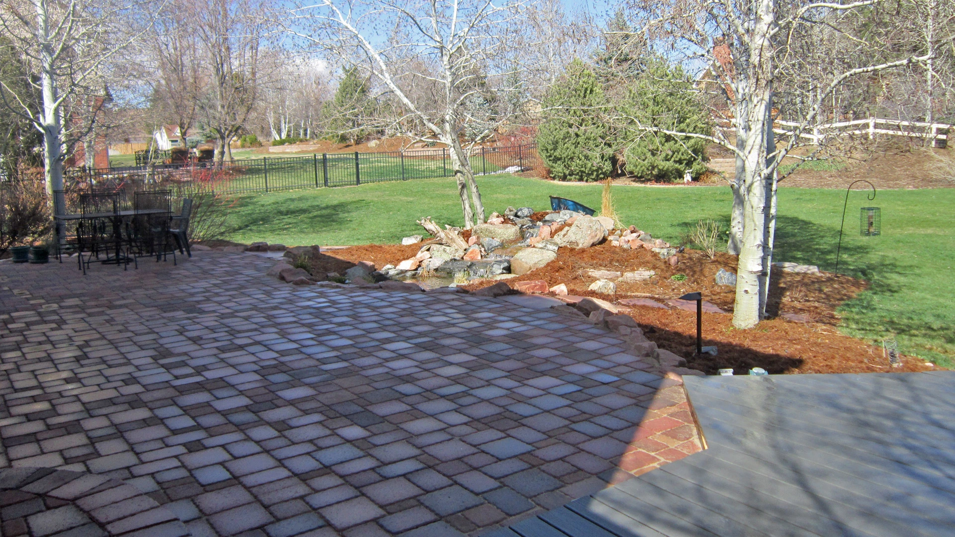 Example of a natural stone patio built by the professionals at Alive Outside Landscaping.