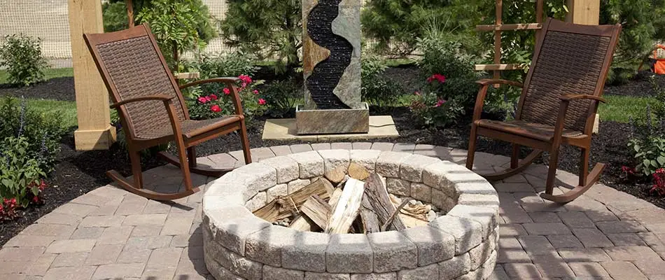 Concrete paver fire pit and patio design in Fort Collins, CO.