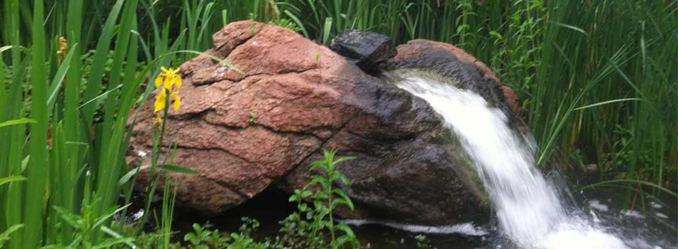 A pond less waterfall being installed at a home in Loveland, CO.