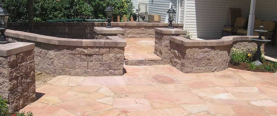 Adding a smaller retaining wall, or seating wall, to your property in Loveland, CO, helps to expand your outdoor living space.