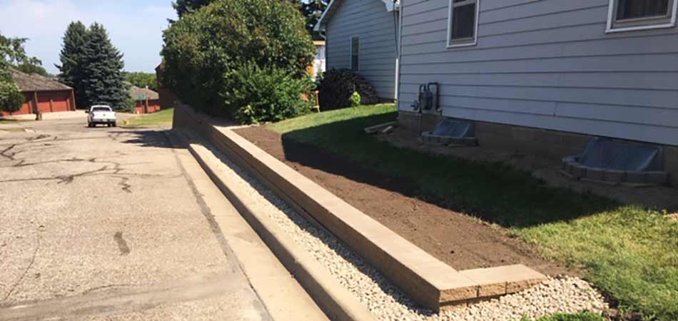 Example of a retaining wall in Loveland, that Alive Outside Landscaping built for a client.