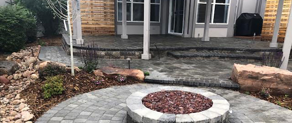 Custom patio and fire pit for a home in Denver, CO.